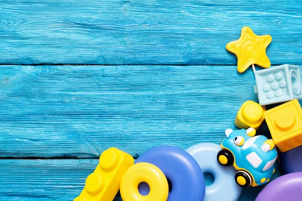 Babyspeelgoed Blauwe Houten Tafelondergrond Met Kopieerruimte Educatieve Spelletjes Voor Kinderen — Stockfoto