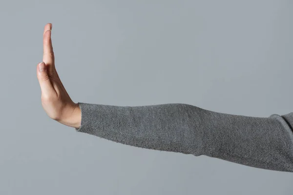 Stoppschild Von Weiblichen Händen Isoliert Auf Grauem Hintergrund — Stockfoto