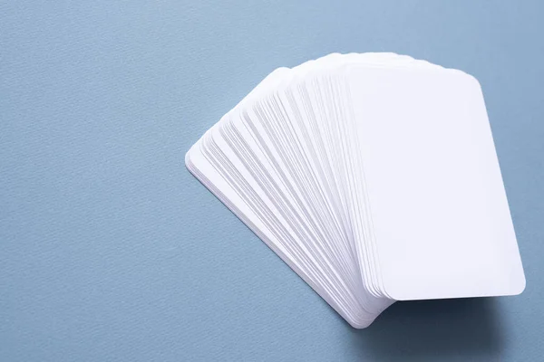 Blank tarot cards with copy space on the white background.