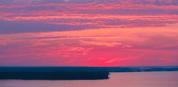 Beautiful sunrise sky with clouds and early sun. Structure and texture. Sunset.