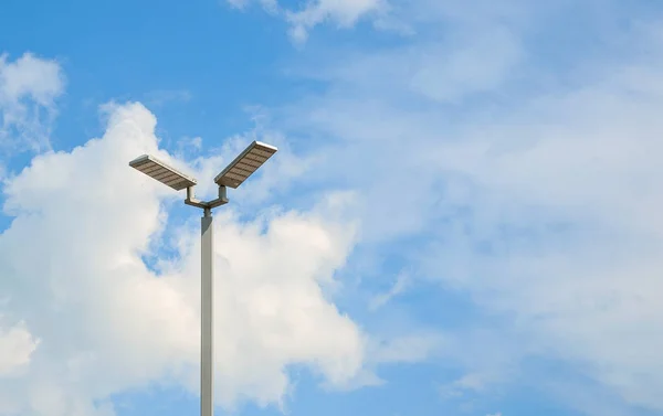 LED street lamps with energy-saving technology, cloud on sky bac