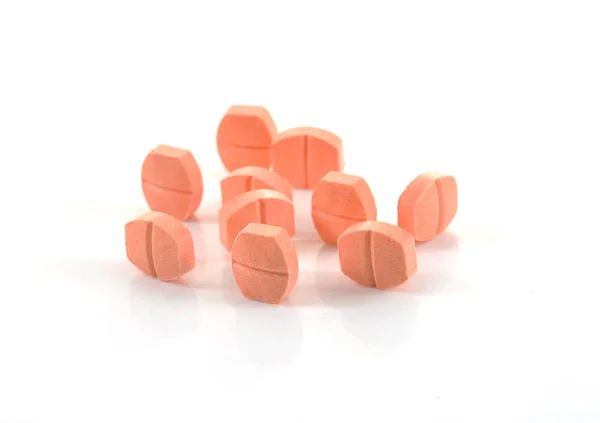 Piller av c-vitamin på vit bakgrund — Stockfoto