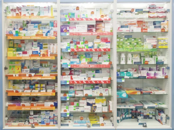 Sale of drugs in a pharmacy on a showcase, background, blurry — 스톡 사진