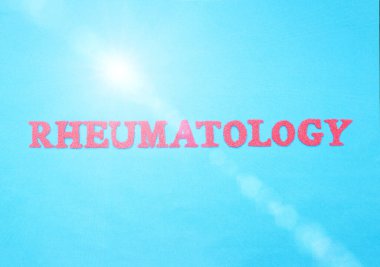 Word Rheumatology in red letters on a blue background. The concept of a section of medicine that treats inflammation and diseases of the joints, arthritis and arthrosis, dermatomyositis clipart