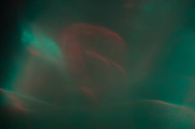 Bulanık mercek parlaması. Odaklanamayan renkli ışıklar. Parlak parlayan noktalar, soyut arkaplan ve doku, kopyalama alanı