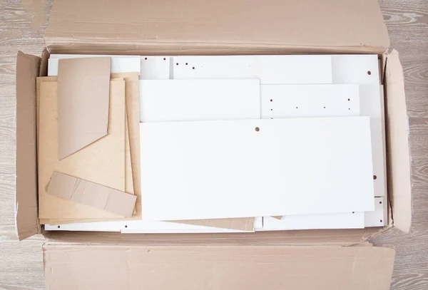 가구 테이블 이 있는 박스. 새로운 가구, 배경, 복사 공간의 집합체 — 스톡 사진