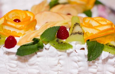 Cake with ornaments from fruit for birthday