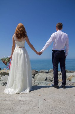 Gelin ve Damat Düğün buket gül tutan