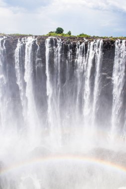 Victoria Şelalesi üzerinde gökkuşağı, Zambiya ve Zimbabve yatılı. Unesco Dünya Mirası