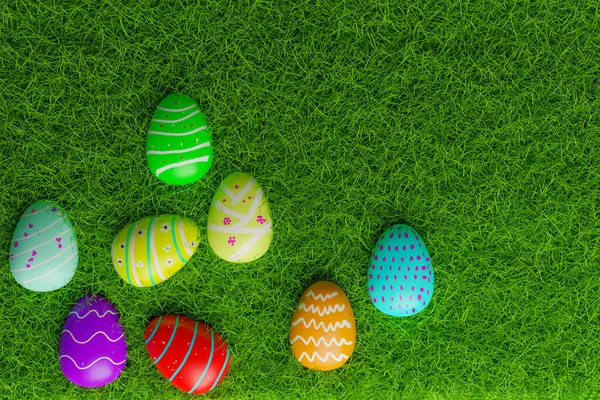 top view of full  color  easter eggs on grass field, 3D render