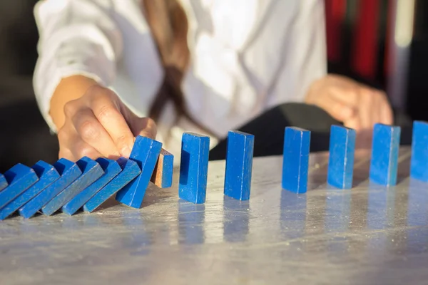 Stopping the domino effect concept for business solution, — Stock Photo, Image