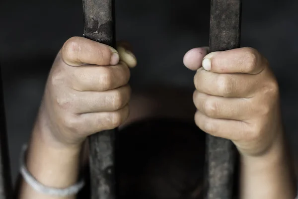 Child was a victim of human trafficking,Imprisoned in a steel cage, Missing kidnapped, Hostage, human trafficking and violence concept — Stock Photo, Image