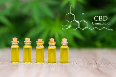 CBD elements in Cannabis,  hemp oil extracts in jars, medical ma clipart