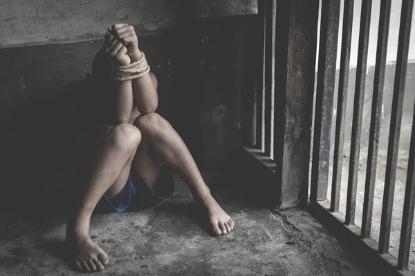 Hopeless child hands tied together with rope, human trafficking, — Stock Photo, Image