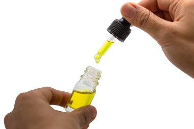 Beyaz üzerine izole pipet kenevir yağı el tutma şişesi