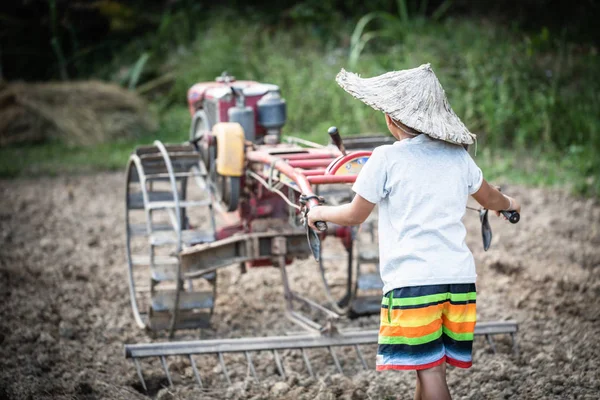 Child labor, Poor children driving a plow farming area, Children — 스톡 사진