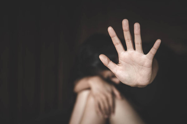 woman raised her hand for dissuade, campaign stop violence again