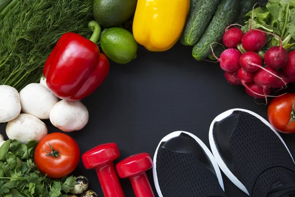 Balanced diet. Healthy food concept. Healthy food background with fresh vegetables. Ingredients for cooking. Top view. Copy space. Dark background. Fitness diet.
