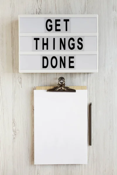 \'Get things done\' words on a modern board, clipboard with blank