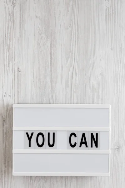 "Sie können" Worte auf einem modernen Brett auf weißem Holzgrund, — Stockfoto