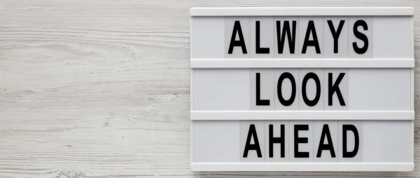 Always Look Ahead Words Lightbox White Wooden Surface Top View — Stock Photo, Image