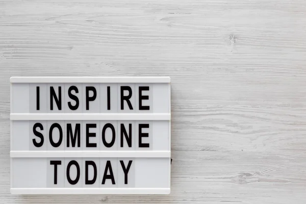 Inspire Someone Today Words Lightbox White Wooden Background Top View — Stock Photo, Image