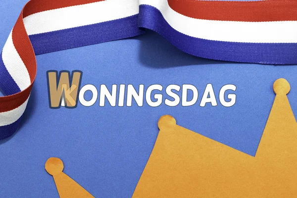 Hollandaca sözcükler Koningsdag ve Woningsdag, Hollanda festivalinin iptali konsepti.