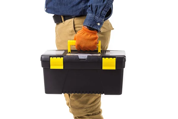 Opravář (Tvůrce) drží pole nástroj v jeho ruce izolovaných na bílém pozadí — Stock fotografie