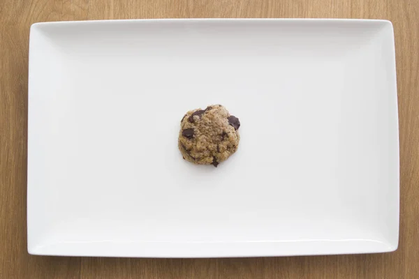 ENSAIO BRANCO COM UMA COOKIE — Fotografia de Stock