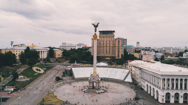 Ukraine. Kiev. July 13, 2017. Aerial view of the Independence Square. Monument of Independence of Ukraine. Hotel Ukraine. Shopping center Globe. People walk around the Maidan. Heavenly Hundred. Kyiv.