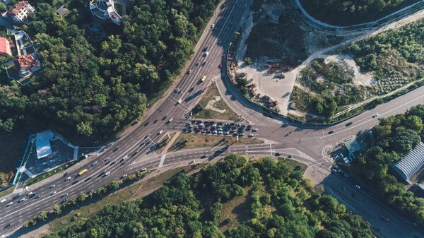 Kiev. Ukraine. July 19, 2017. Motherland. Aerial view of the traffic junction. Cars are driving along the road.