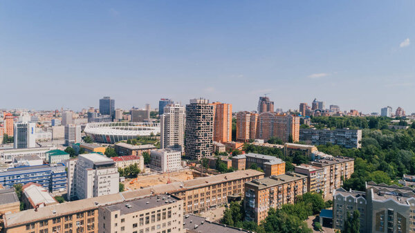 Киев. Украина. 13 июня 2017 года. Олимпийский стадион. Вид с воздуха на Олимпийский национальный комитет. Много зданий. День. Облака. Белое небо. Деревья. Чемпионат мира по футболу. Соревнование. Спорт. Чемпионат Европы по футболу
.