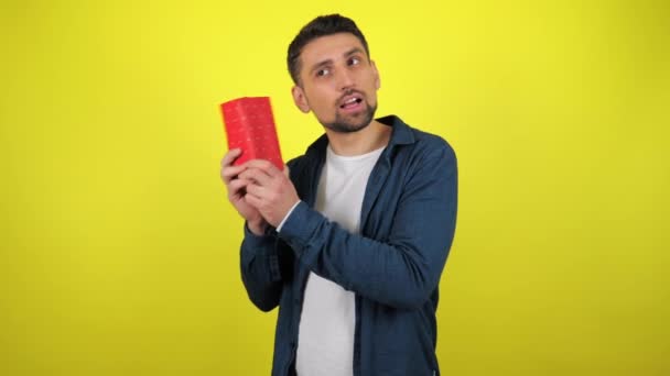 Young Man White Shirt Gift His Hands Cowards Box His — Stock Video