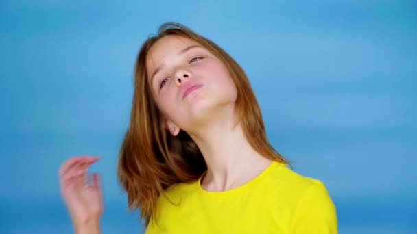 Happy Teen Girl Yellow Shirt Showing Thumbs Looking Camera Blue — Stock Video