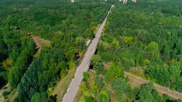 Aerial view panorama of intersection of road and railway near Chernobyl — 비디오