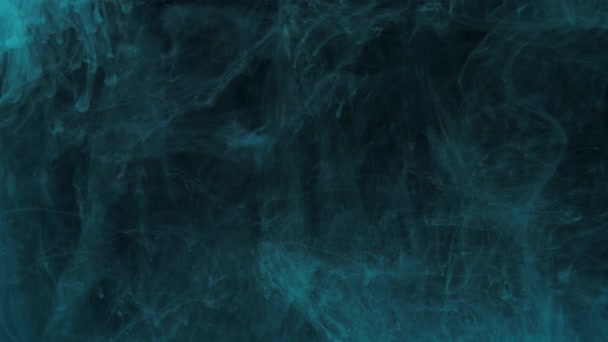 Green ink mixing in water, swirling softly underwater. Art background — Stock Video