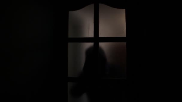 Shadow Man Knife Dark Silhouette Man Hands Frosted Glass — Stock Video