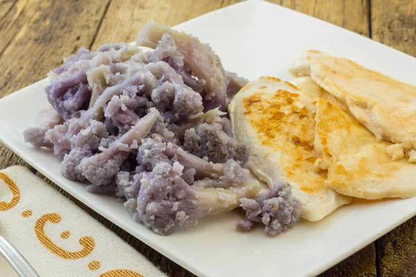 Turkey breast served with purple cauliflower — Stock Photo, Image