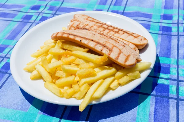 Wurstell with potato chips — Stock Photo, Image