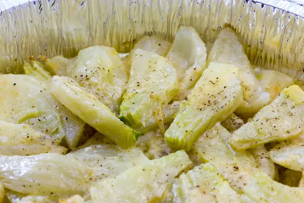 Fennel cooked in a pan with cheese — Stock Photo, Image