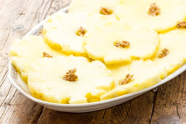 Pineapple slices in a dish — Stock Photo, Image