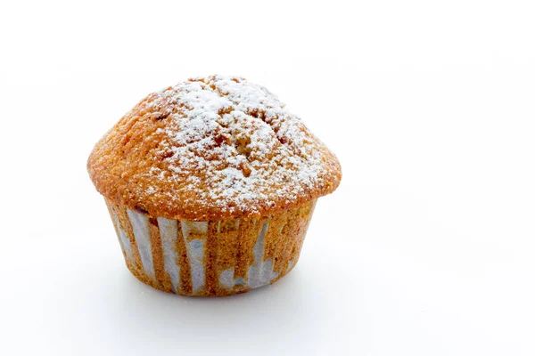 Muffins em uma mesa de madeira — Fotografia de Stock