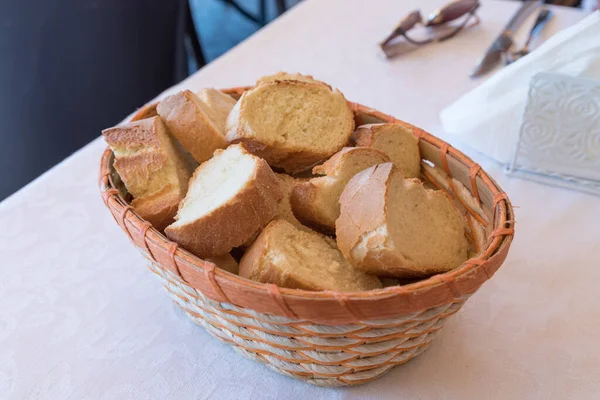 Basket full of sliced white bread — Stock Photo, Image