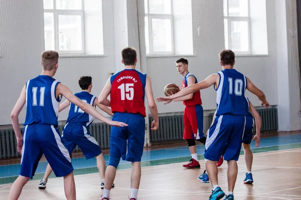 Orenburg, Russia - 15 May 2015: Boys play basketball