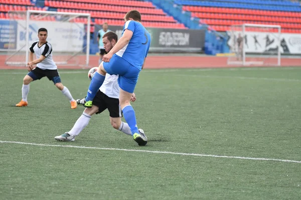 Orenburg, Russia, 8 June 2017 year: Men play soccer — Stock Photo, Image