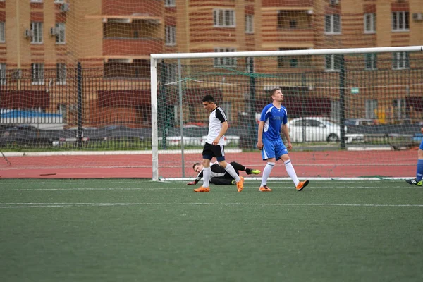 Orenburg, Russia, 8 June 2017 year: Men play soccer — Stock Photo, Image