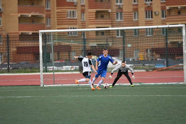 Orenburg, Russia, 8 June 2017 year: Men play soccer — Stock Photo, Image