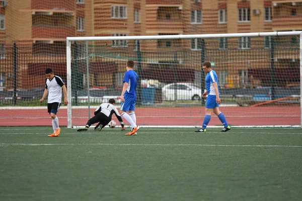 Orenburg, Russia, 8 June 2017 year: Men play soccer — Stock Photo, Image