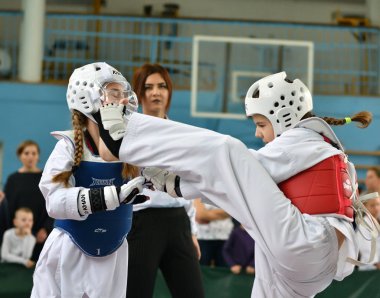 Orenburg, Russia - October 19, 2019: Girls compete in taekwondo