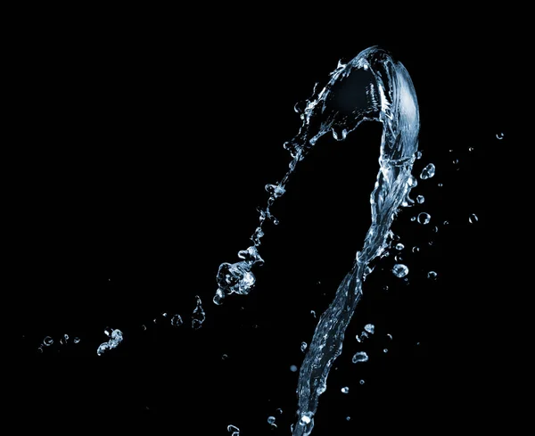Wasserspritzer auf einem schwarzen — Stockfoto